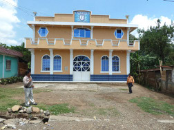 a mountain church building that 
has been in a building phase 24 years