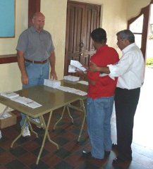 Larry selling books at SETECA